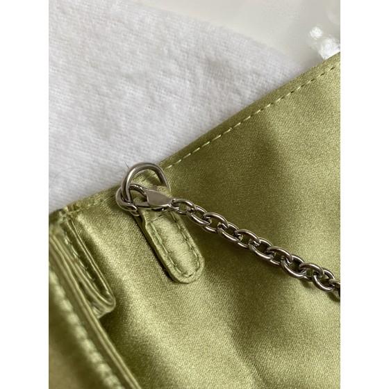 Vintage and Musthaves. CHRISTIAN DIOR green cannage satin clutch bag
