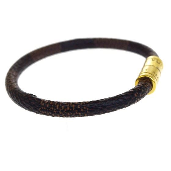 Vintage and Musthaves. Louis Vuitton keep it damier gold bracelet